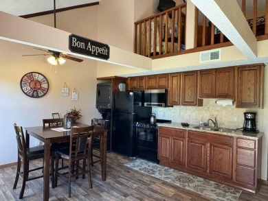 Step into luxury with this fully furnished and updated on Pointe Royale Village Country Club in Missouri - for sale on GolfHomes.com, golf home, golf lot
