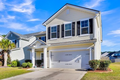This beautiful two-story home is nestled on a pond-front lot in on Cypress Point Par 3 in South Carolina - for sale on GolfHomes.com, golf home, golf lot