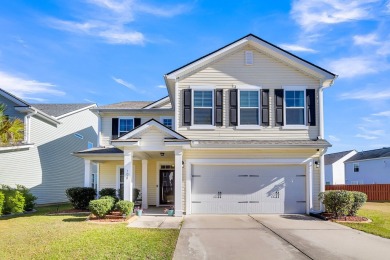 This beautiful two-story home is nestled on a pond-front lot in on Cypress Point Par 3 in South Carolina - for sale on GolfHomes.com, golf home, golf lot