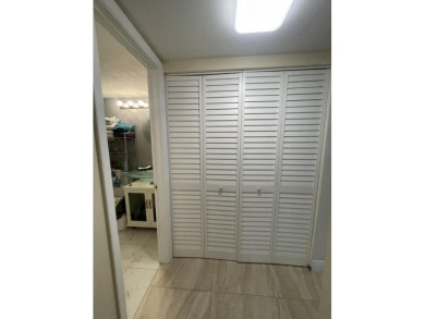 Spacious and bright 2nd floor unit in a 55+ gated community with on Indian Spring Golf and Country Club in Florida - for sale on GolfHomes.com, golf home, golf lot
