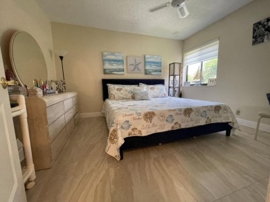 Spacious and bright 2nd floor unit in a 55+ gated community with on Indian Spring Golf and Country Club in Florida - for sale on GolfHomes.com, golf home, golf lot