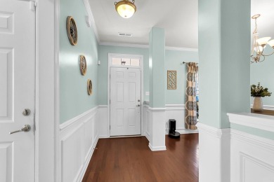 This beautiful two-story home is nestled on a pond-front lot in on Cypress Point Par 3 in South Carolina - for sale on GolfHomes.com, golf home, golf lot