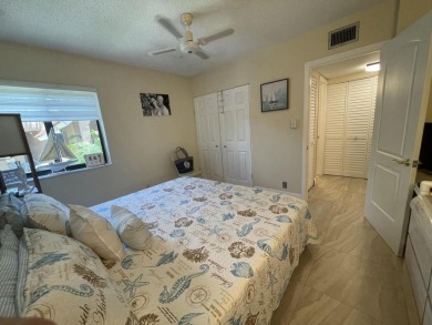 Spacious and bright 2nd floor unit in a 55+ gated community with on Indian Spring Golf and Country Club in Florida - for sale on GolfHomes.com, golf home, golf lot