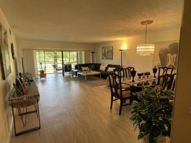 Spacious and bright 2nd floor unit in a 55+ gated community with on Indian Spring Golf and Country Club in Florida - for sale on GolfHomes.com, golf home, golf lot