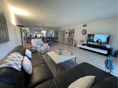 Spacious and bright 2nd floor unit in a 55+ gated community with on Indian Spring Golf and Country Club in Florida - for sale on GolfHomes.com, golf home, golf lot