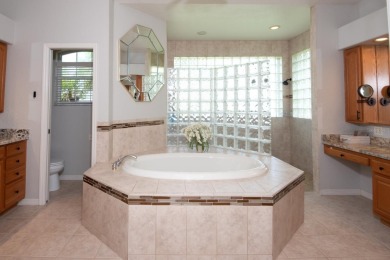 Welcome to this spacious and beautifully maintained 4-bedroom, 3 on Apollo Beach Golf and Sea Club in Florida - for sale on GolfHomes.com, golf home, golf lot