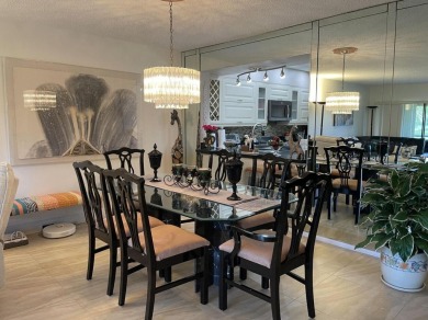 Spacious and bright 2nd floor unit in a 55+ gated community with on Indian Spring Golf and Country Club in Florida - for sale on GolfHomes.com, golf home, golf lot