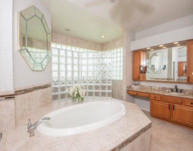 Welcome to this spacious and beautifully maintained 4-bedroom, 3 on Apollo Beach Golf and Sea Club in Florida - for sale on GolfHomes.com, golf home, golf lot