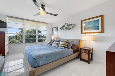 Nestled in a charming five-story condo community, this home on Palm-Aire Country Club and Resort - Palms in Florida - for sale on GolfHomes.com, golf home, golf lot