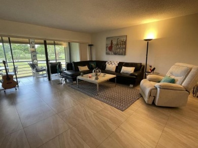 Spacious and bright 2nd floor unit in a 55+ gated community with on Indian Spring Golf and Country Club in Florida - for sale on GolfHomes.com, golf home, golf lot