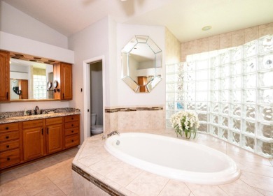 Welcome to this spacious and beautifully maintained 4-bedroom, 3 on Apollo Beach Golf and Sea Club in Florida - for sale on GolfHomes.com, golf home, golf lot