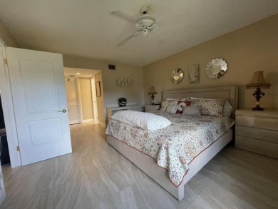 Spacious and bright 2nd floor unit in a 55+ gated community with on Indian Spring Golf and Country Club in Florida - for sale on GolfHomes.com, golf home, golf lot