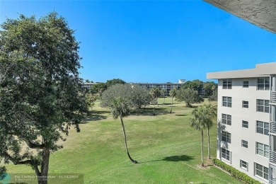 Nestled in a charming five-story condo community, this home on Palm-Aire Country Club and Resort - Palms in Florida - for sale on GolfHomes.com, golf home, golf lot