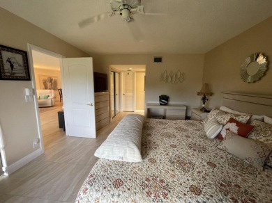 Spacious and bright 2nd floor unit in a 55+ gated community with on Indian Spring Golf and Country Club in Florida - for sale on GolfHomes.com, golf home, golf lot