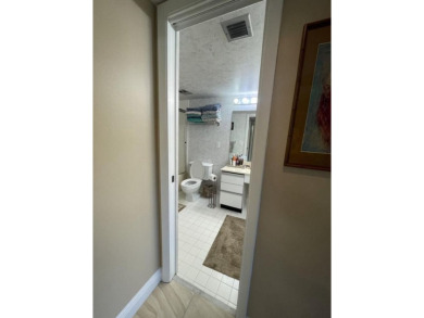 Spacious and bright 2nd floor unit in a 55+ gated community with on Indian Spring Golf and Country Club in Florida - for sale on GolfHomes.com, golf home, golf lot