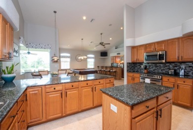 Welcome to this spacious and beautifully maintained 4-bedroom, 3 on Apollo Beach Golf and Sea Club in Florida - for sale on GolfHomes.com, golf home, golf lot