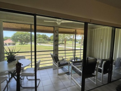 Spacious and bright 2nd floor unit in a 55+ gated community with on Indian Spring Golf and Country Club in Florida - for sale on GolfHomes.com, golf home, golf lot