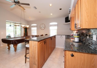 Welcome to this spacious and beautifully maintained 4-bedroom, 3 on Apollo Beach Golf and Sea Club in Florida - for sale on GolfHomes.com, golf home, golf lot