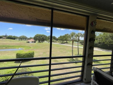 Spacious and bright 2nd floor unit in a 55+ gated community with on Indian Spring Golf and Country Club in Florida - for sale on GolfHomes.com, golf home, golf lot
