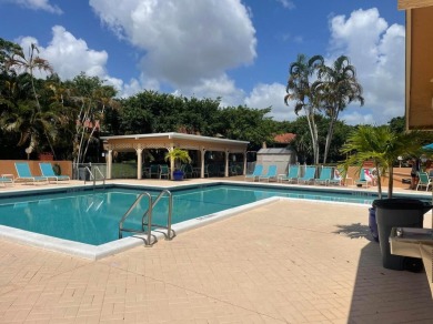 Spacious and bright 2nd floor unit in a 55+ gated community with on Indian Spring Golf and Country Club in Florida - for sale on GolfHomes.com, golf home, golf lot
