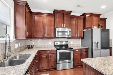This beautiful two-story home is nestled on a pond-front lot in on Cypress Point Par 3 in South Carolina - for sale on GolfHomes.com, golf home, golf lot