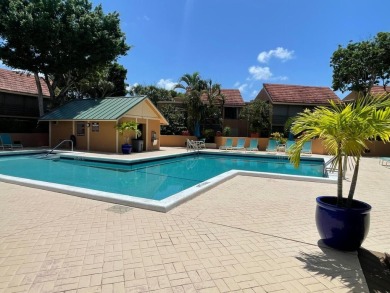 Spacious and bright 2nd floor unit in a 55+ gated community with on Indian Spring Golf and Country Club in Florida - for sale on GolfHomes.com, golf home, golf lot