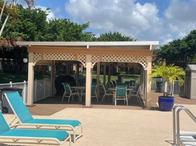 Spacious and bright 2nd floor unit in a 55+ gated community with on Indian Spring Golf and Country Club in Florida - for sale on GolfHomes.com, golf home, golf lot