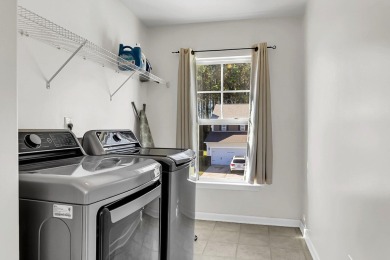 This beautiful two-story home is nestled on a pond-front lot in on Cypress Point Par 3 in South Carolina - for sale on GolfHomes.com, golf home, golf lot