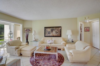 WELCOME TO THIS CONVENIENT 1ST FLOOR CONDO WITH BEAUTIFUL WATER on Poinciana Golf Club in Florida - for sale on GolfHomes.com, golf home, golf lot