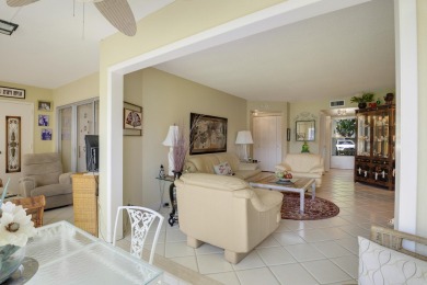 WELCOME TO THIS CONVENIENT 1ST FLOOR CONDO WITH BEAUTIFUL WATER on Poinciana Golf Club in Florida - for sale on GolfHomes.com, golf home, golf lot