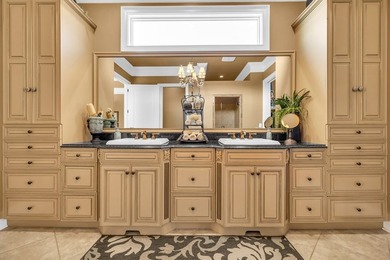 Elegant Waterfront Living in Plantation Community! Nestled on The Patriot Golf Club At Grand Harbor in South Carolina - for sale on GolfHomes.com, golf home, golf lot