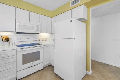 Welcome to your dream retreat in this stunning two-bedroom on IMG Academies Golf and Country Club in Florida - for sale on GolfHomes.com, golf home, golf lot