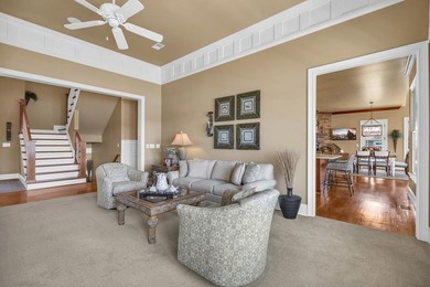 Elegant Waterfront Living in Plantation Community! Nestled on The Patriot Golf Club At Grand Harbor in South Carolina - for sale on GolfHomes.com, golf home, golf lot