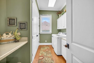 Elegant Waterfront Living in Plantation Community! Nestled on The Patriot Golf Club At Grand Harbor in South Carolina - for sale on GolfHomes.com, golf home, golf lot