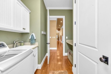 Elegant Waterfront Living in Plantation Community! Nestled on The Patriot Golf Club At Grand Harbor in South Carolina - for sale on GolfHomes.com, golf home, golf lot