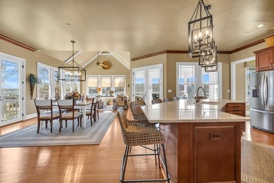 Elegant Waterfront Living in Plantation Community! Nestled on The Patriot Golf Club At Grand Harbor in South Carolina - for sale on GolfHomes.com, golf home, golf lot