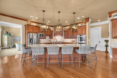 Elegant Waterfront Living in Plantation Community! Nestled on The Patriot Golf Club At Grand Harbor in South Carolina - for sale on GolfHomes.com, golf home, golf lot