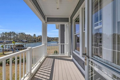 Elegant Waterfront Living in Plantation Community! Nestled on The Patriot Golf Club At Grand Harbor in South Carolina - for sale on GolfHomes.com, golf home, golf lot