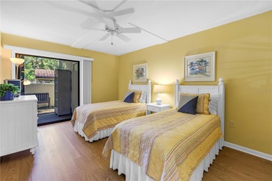 Welcome to your dream retreat in this stunning two-bedroom on IMG Academies Golf and Country Club in Florida - for sale on GolfHomes.com, golf home, golf lot