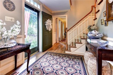 Tucked on a quiet, tree-lined street in Kingsmill, this on Kingsmill Resort and Golf Club in Virginia - for sale on GolfHomes.com, golf home, golf lot
