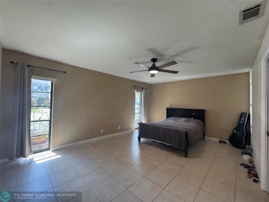 Amazing villa with 2 master suites. Walk in closets in both on Jacaranda Golf Club in Florida - for sale on GolfHomes.com, golf home, golf lot
