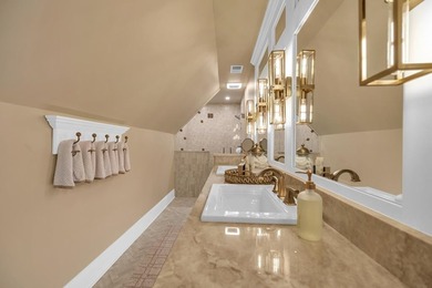 Elegant Waterfront Living in Plantation Community! Nestled on The Patriot Golf Club At Grand Harbor in South Carolina - for sale on GolfHomes.com, golf home, golf lot