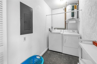 Welcome to your dream retreat in this stunning two-bedroom on IMG Academies Golf and Country Club in Florida - for sale on GolfHomes.com, golf home, golf lot