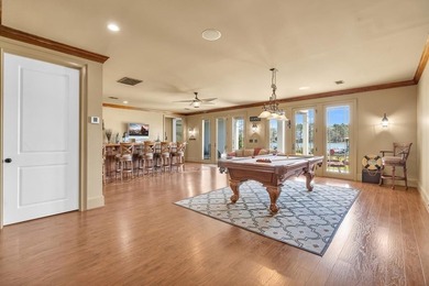 Elegant Waterfront Living in Plantation Community! Nestled on The Patriot Golf Club At Grand Harbor in South Carolina - for sale on GolfHomes.com, golf home, golf lot