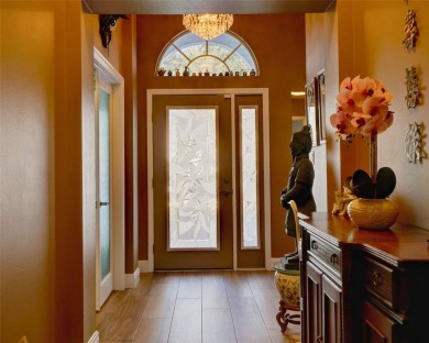 This meticulously-kept custom home offers an oversized custom on Plantation Golf Club in Florida - for sale on GolfHomes.com, golf home, golf lot
