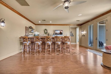 Elegant Waterfront Living in Plantation Community! Nestled on The Patriot Golf Club At Grand Harbor in South Carolina - for sale on GolfHomes.com, golf home, golf lot