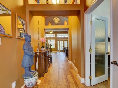 This meticulously-kept custom home offers an oversized custom on Plantation Golf Club in Florida - for sale on GolfHomes.com, golf home, golf lot