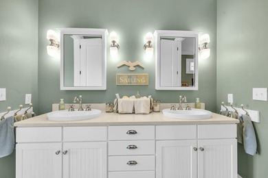 Elegant Waterfront Living in Plantation Community! Nestled on The Patriot Golf Club At Grand Harbor in South Carolina - for sale on GolfHomes.com, golf home, golf lot