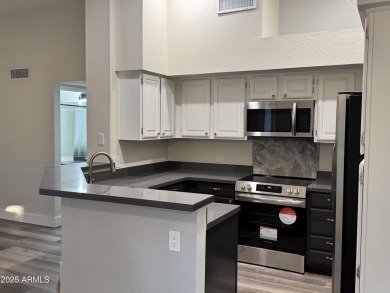Freshly updated with kitchen appliances, countertops, flooring on Stonecreek Golf Club in Arizona - for sale on GolfHomes.com, golf home, golf lot