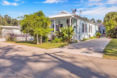 This charming cottage and guest house on the second block of on The Bridges Golf Club At Hollywood Casino in Mississippi - for sale on GolfHomes.com, golf home, golf lot